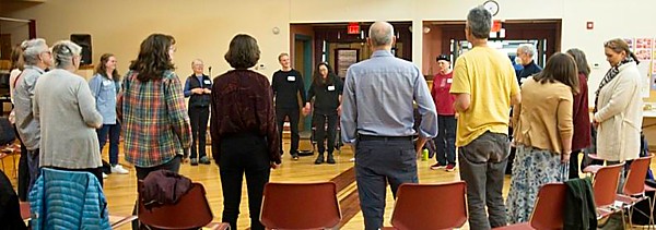 Advocates gather in a circle
