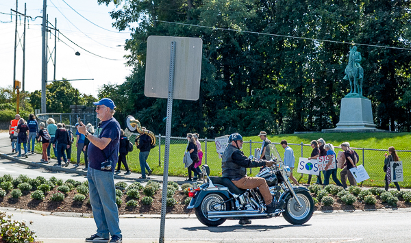 Protesters march in large circle near Davensport Bridge