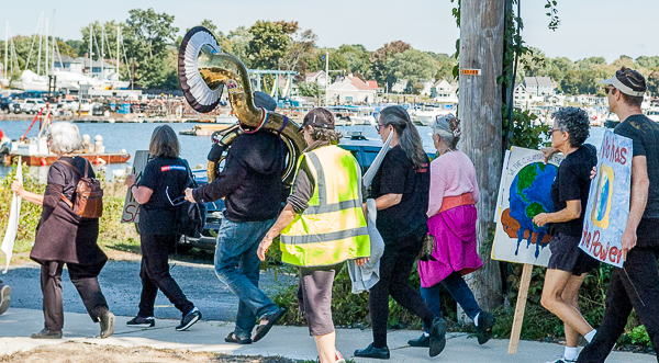 Protesters march towards the Davensport Bridge